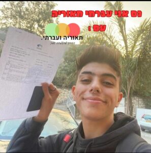 מ